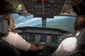 pilot and copilot inside cabin